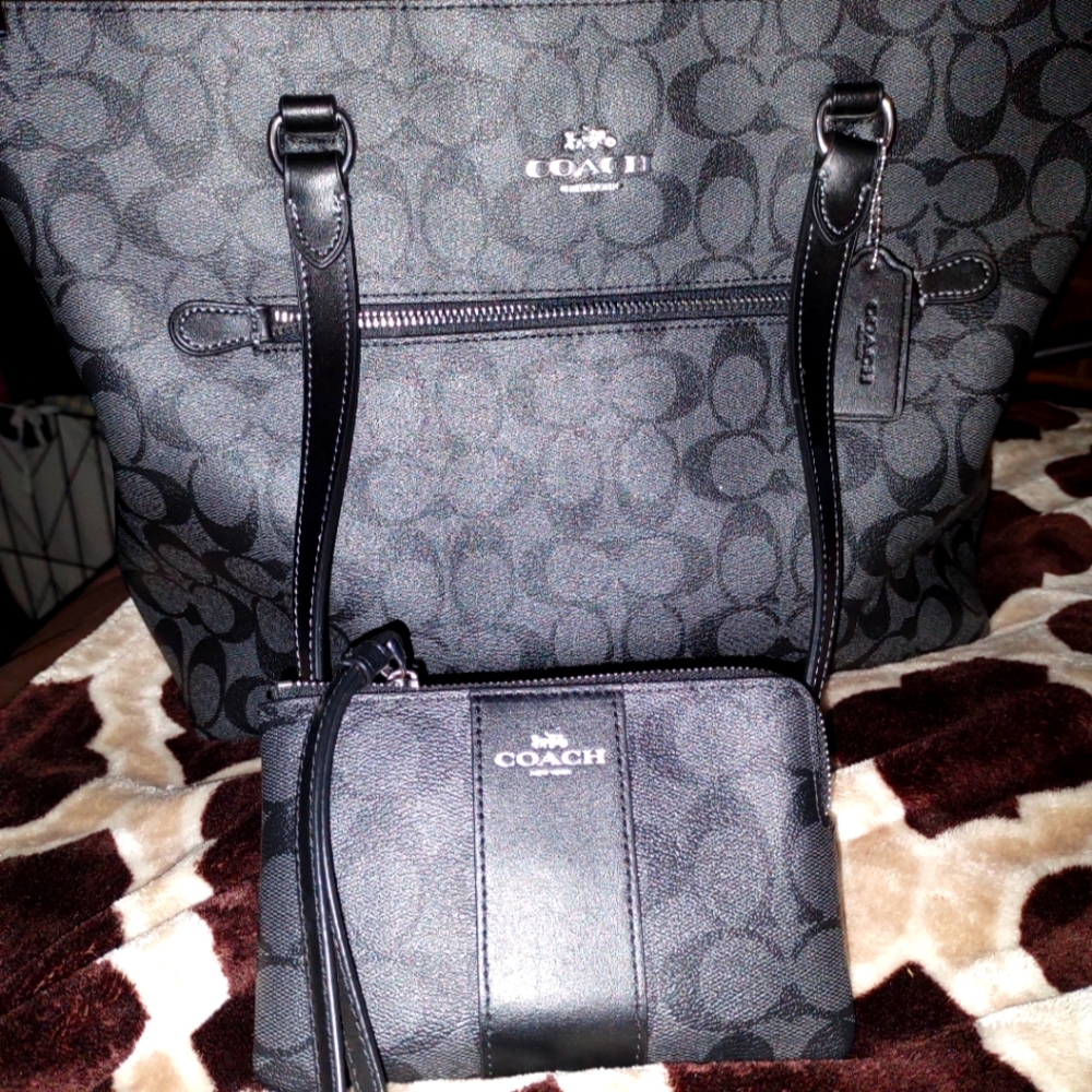 Large COACH signature black gallery tote with matching wristlet.Like new